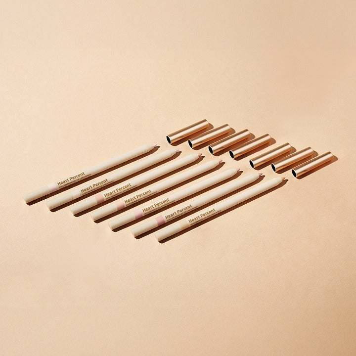 HEART PERCENT Dot On Mood Gel Eyeliner Pencil with caps displayed on a neutral background.