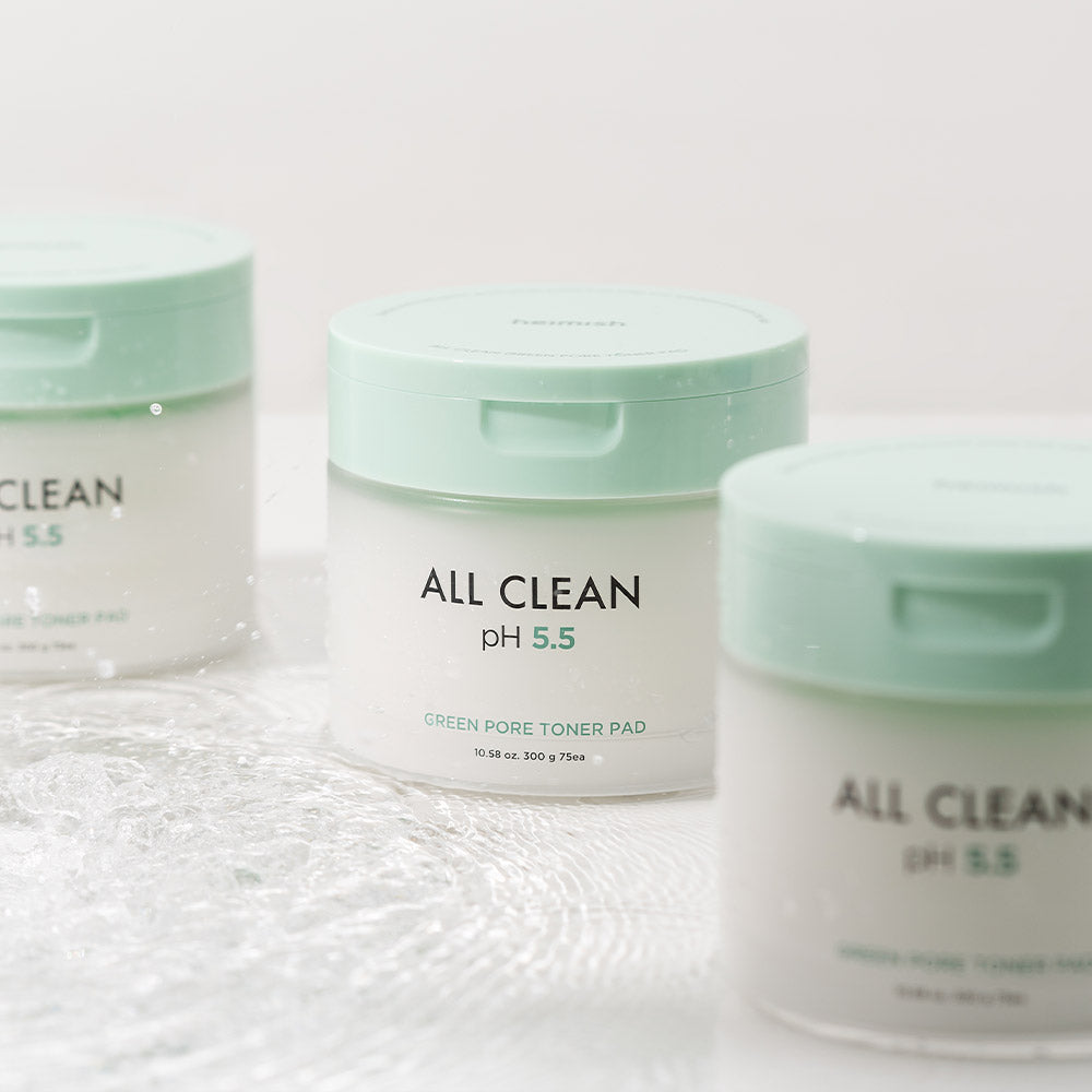 HEIMISH All Clean Green Pore Toner Pad 300ml containers on a textured surface