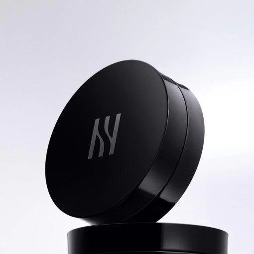 HERA Black Cushion Foundation SPF34 PA++ 15g compact case on display
