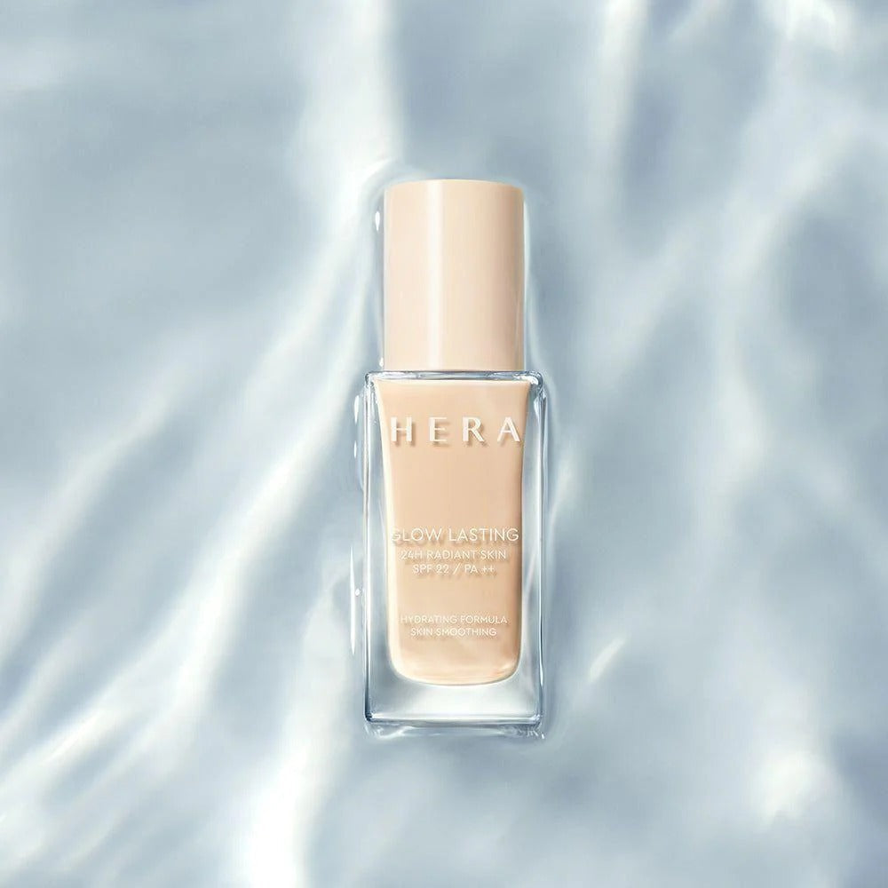 HERA Glow Lasting 24H Radiant Skin SPF22 PA++ 30g on a silky background