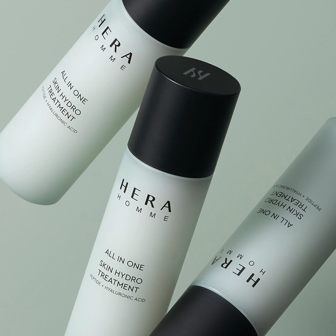 HERA Homme All-in-One Skin Hydro Treatment 150ml bottles with sleek design, premium skincare for men, hydrating and rejuvenating formula.