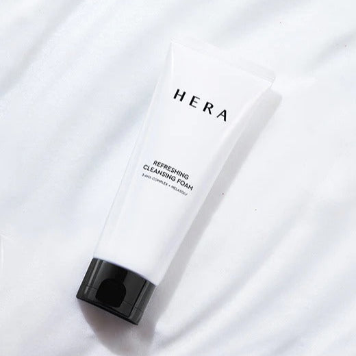 HERA Refreshing Cleansing Foam 160g on white background, elegant design, skin purification, premium foaming cleanser.