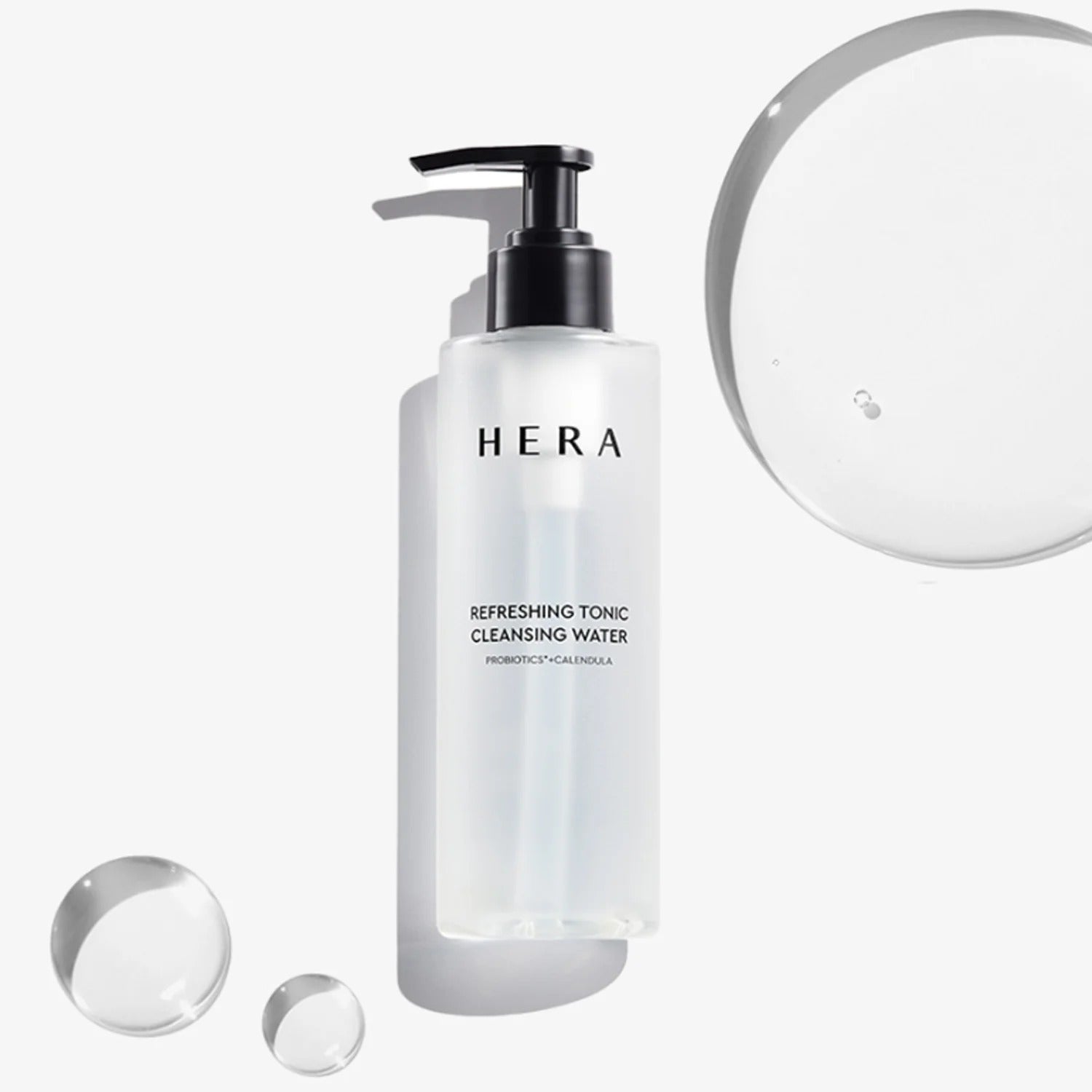 HERA Refreshing Tonic Cleansing Water 200ml bottle with circular water drops in a minimalistic white design.