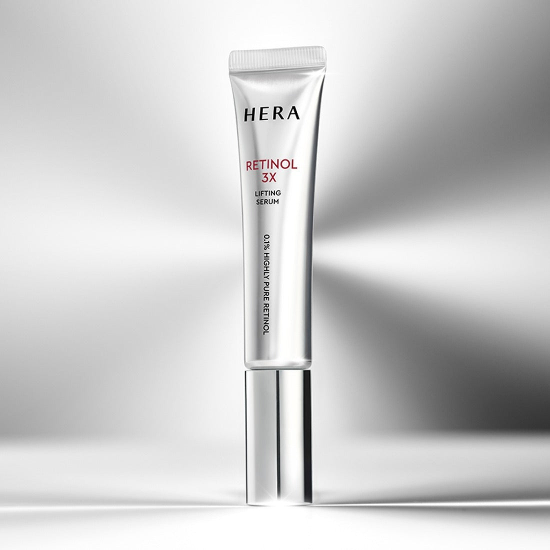 HERA Retinol 3X Lifting Serum 25ml in sleek silver tube for anti-aging skincare.
