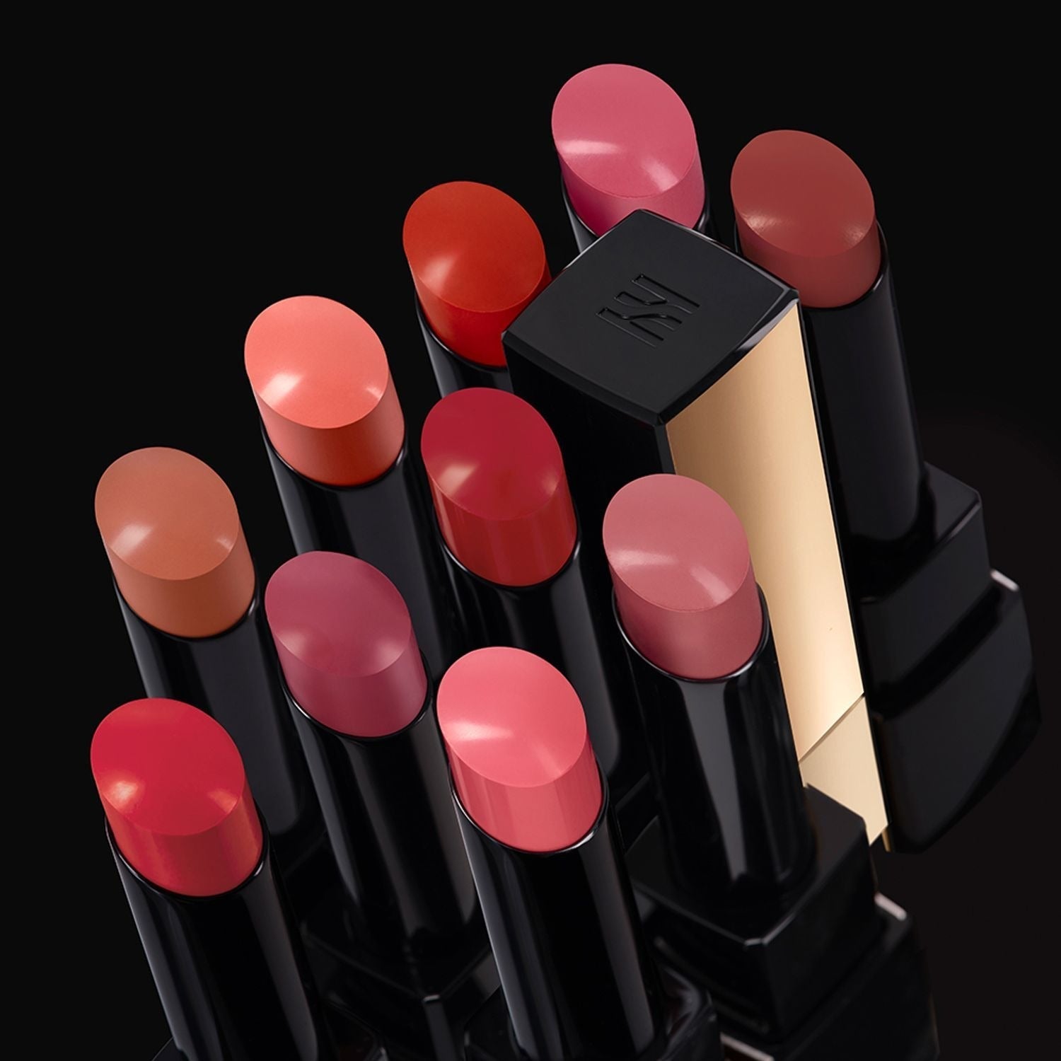 Variety of HERA Rouge Clasyy 3.5g lipsticks in vibrant shades on display, elegance and luxury makeup product.