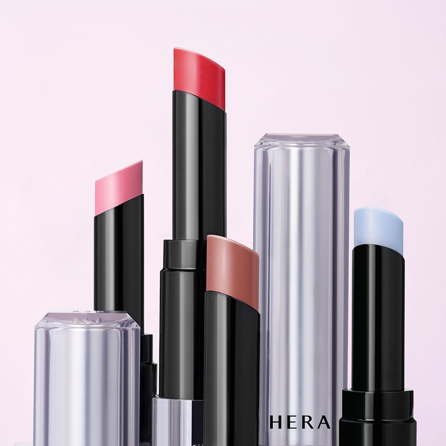 HERA Sensual Nude Balm 3.5g lipsticks in various shades, featuring sleek packaging and vibrant colors, perfect for a bold look.