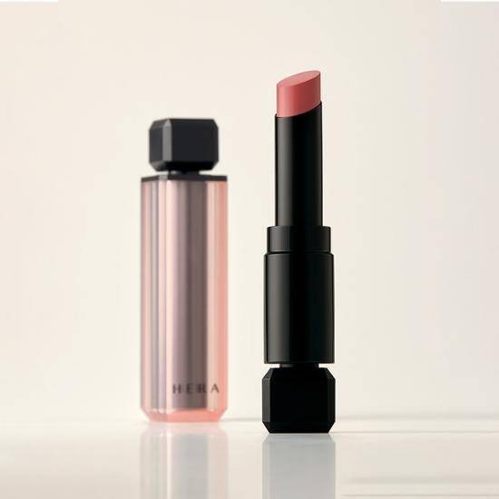HERA Sensual Powder Matte Lipstick 3g featuring sleek black and pink packaging against a minimalist background.