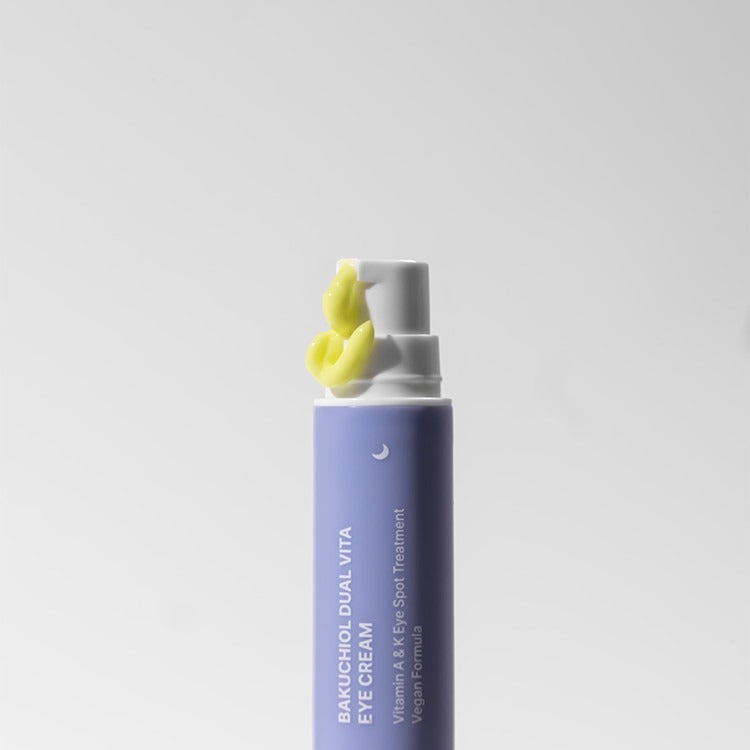 HERBLOOM Bakuchiol Dual Vita Eye Cream tube with lotion swatch, showcasing anti-aging and hydrating properties for vibrant eyes.
