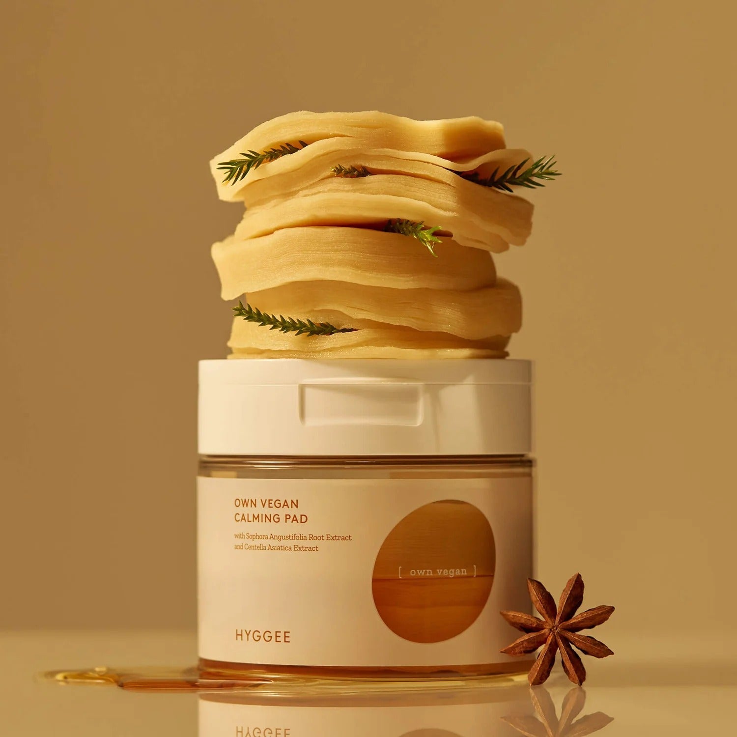 HYGGEE Own Vegan Calming Pad 70 Pads stacked on jar, soothing vegan skincare solution with calming ingredients.