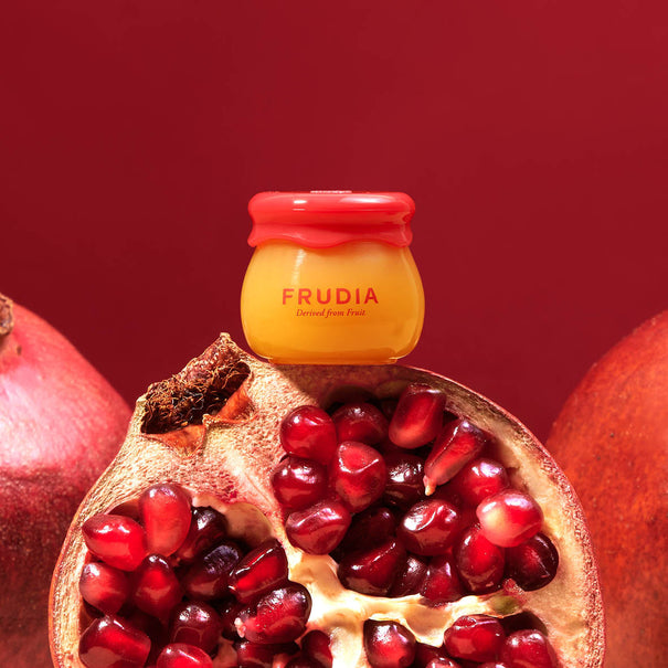 FRUDIA Pomegranate Honey 3 in 1 Lip Balm 10g Available on Seoulbazaar, your online store for trendy korean products.