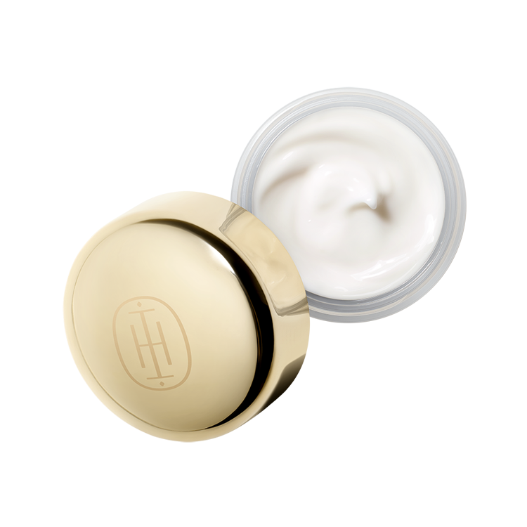 Open jar of HOLITUAL Concentrate Signature Cream Light 80ml showcasing creamy texture.