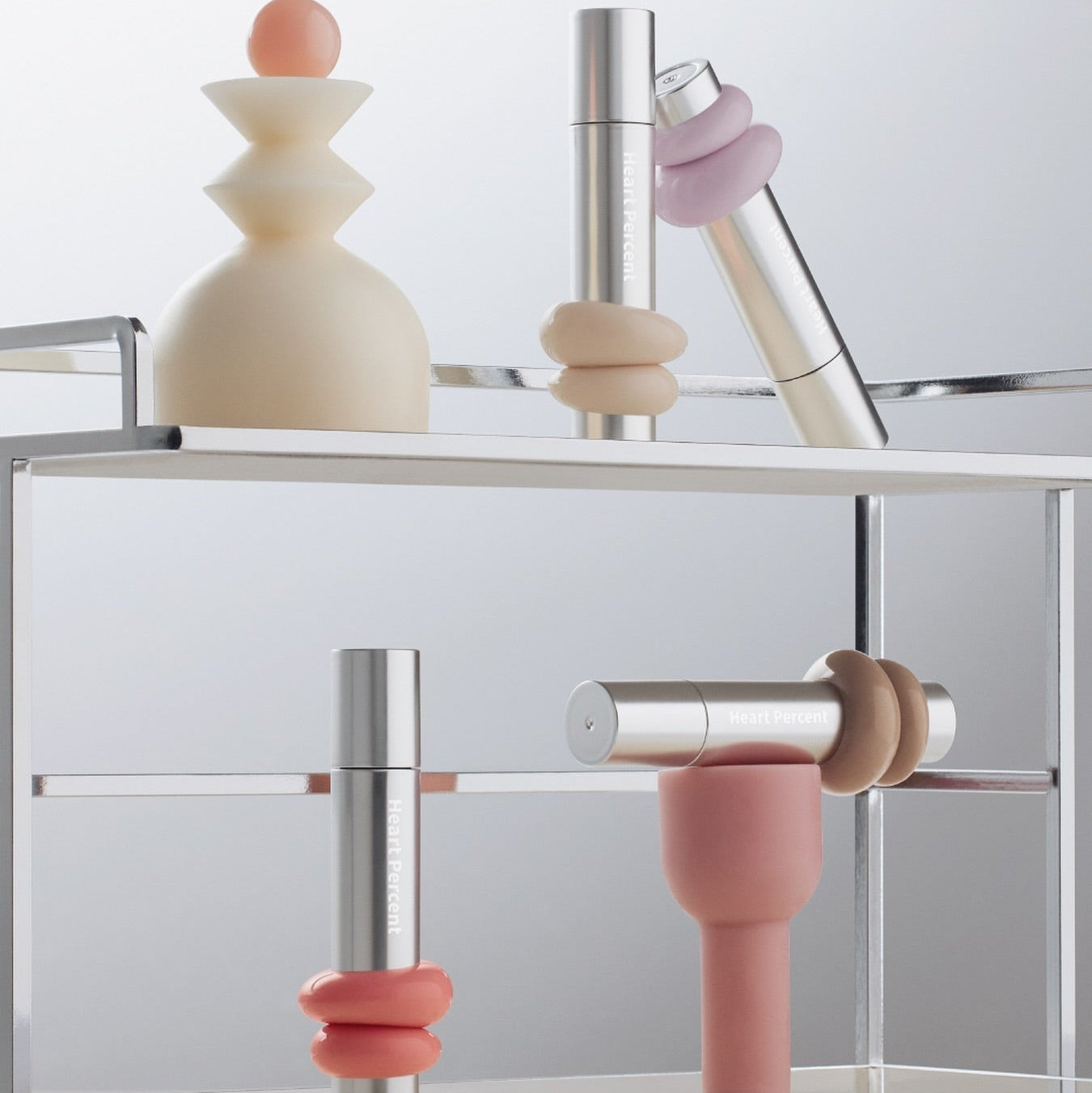 Display of HEART PERCENT Dot On Mood One Way Glow Tint on modern shelf.