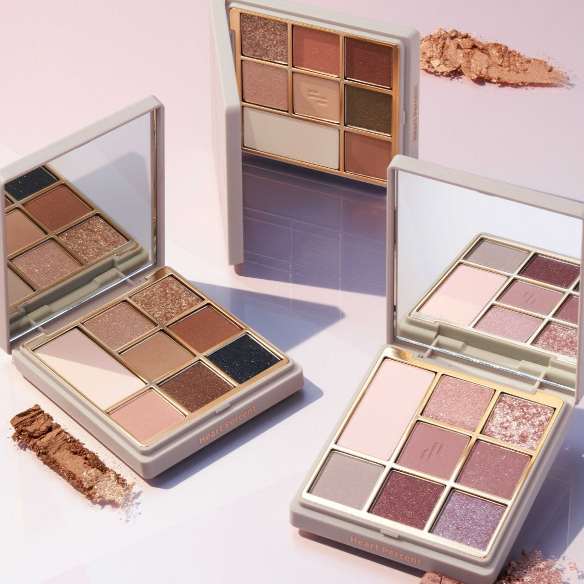 HEART PERCENT Dot On Mood Eye Palette showcasing diverse shades in elegant packaging, perfect for creating versatile eye makeup looks.