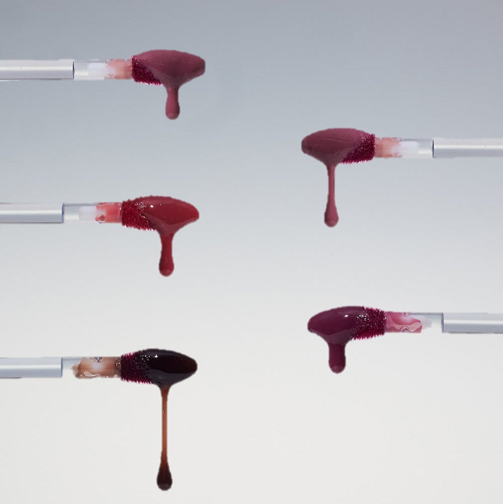 HEART PERCENT Dot On Mood One Way Glow Tint samples showing vibrant colors on applicators against a light background.